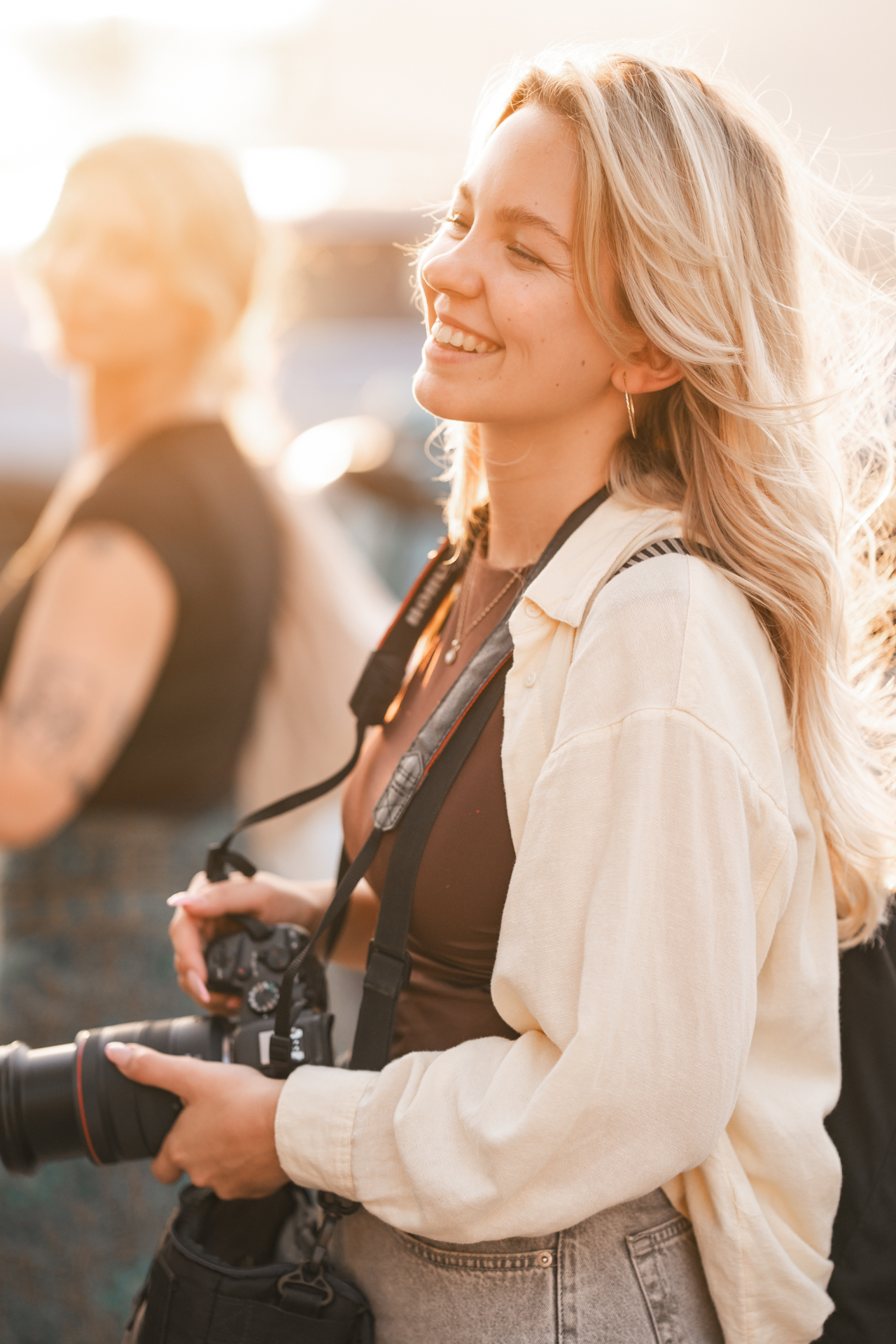 Photographer working on location in warm evening light