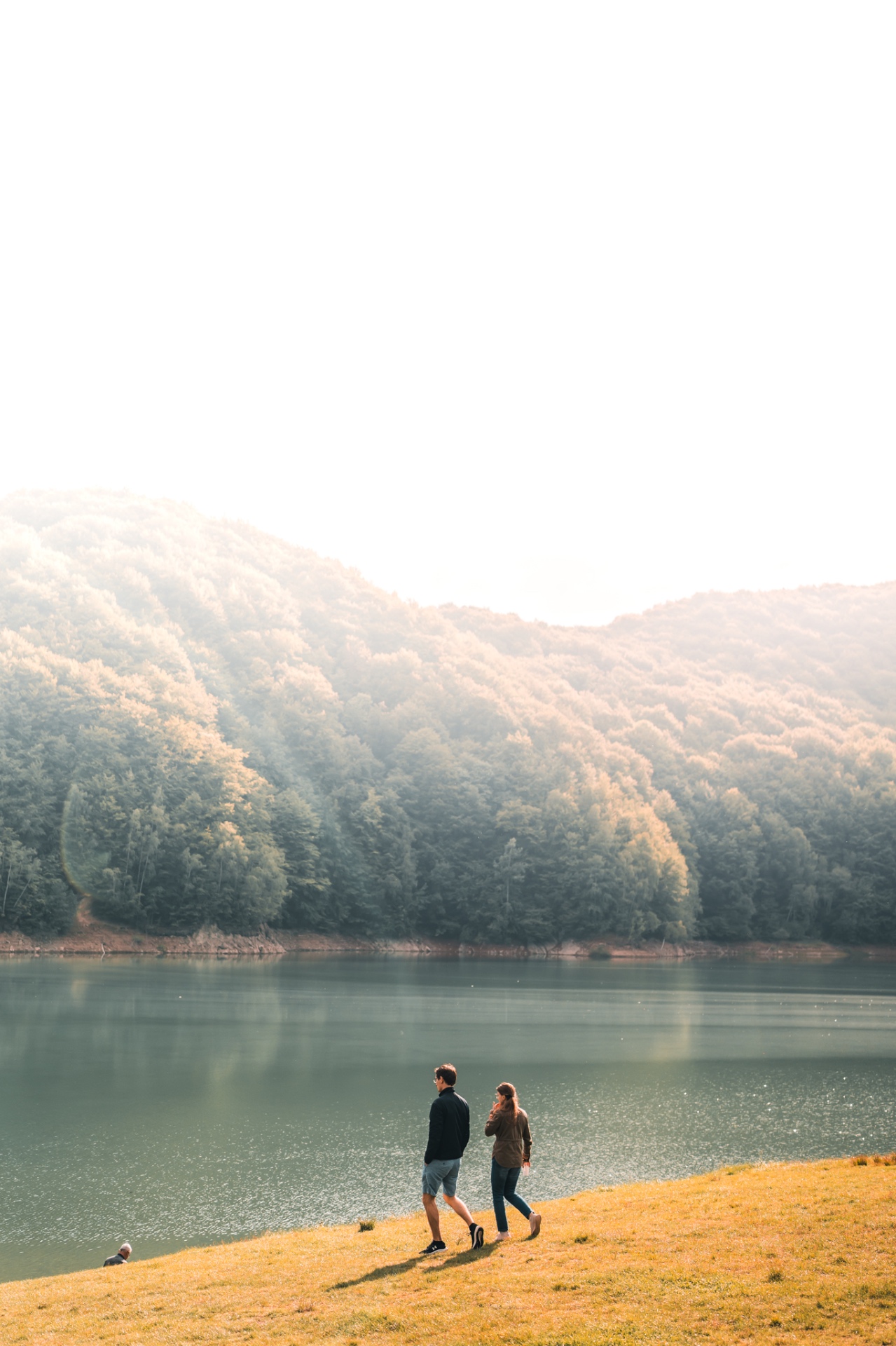 Travel scene beside a mountain lake photographed by Dor Sasson