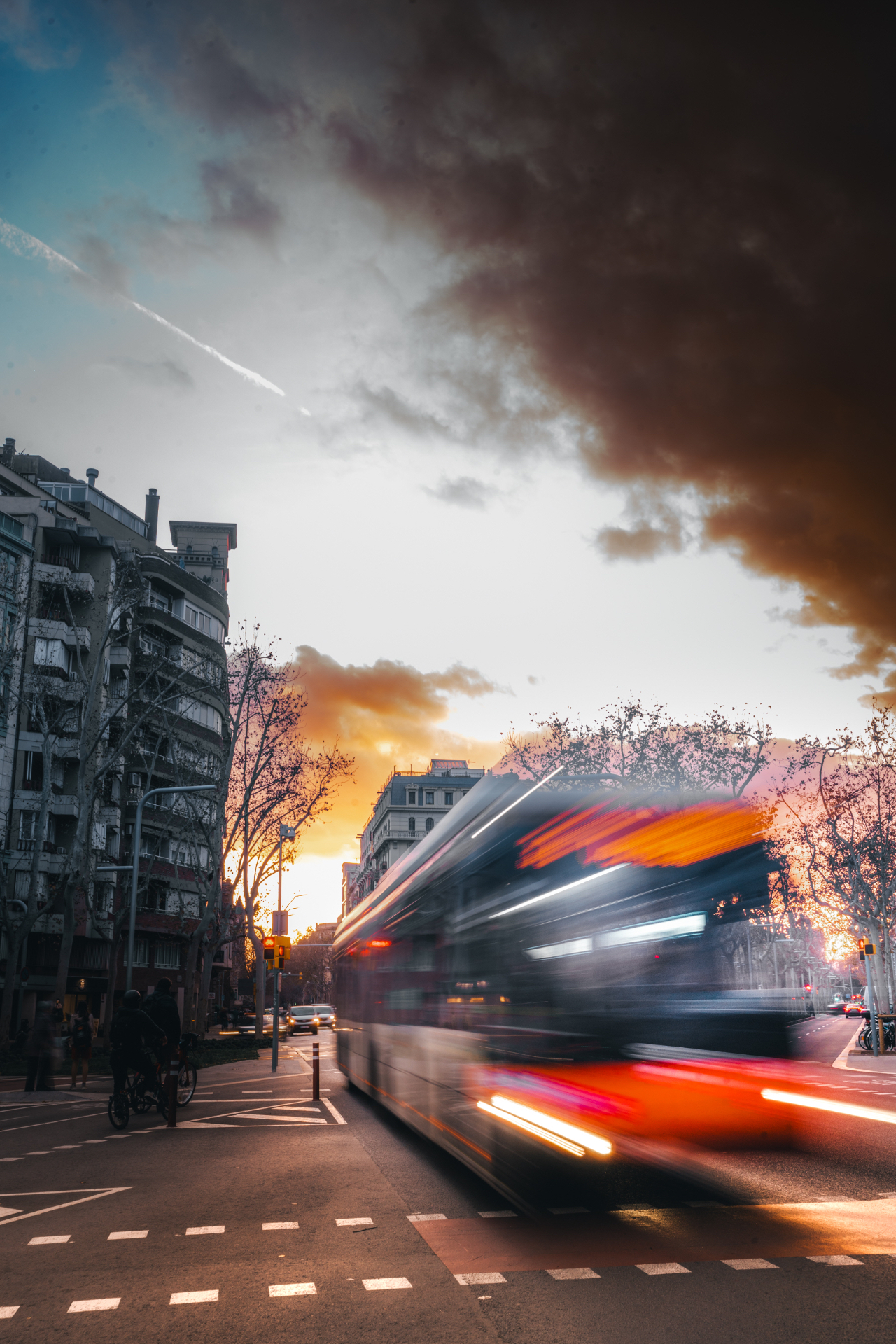 City bus in motion at sunset photographed by Dor Sasson